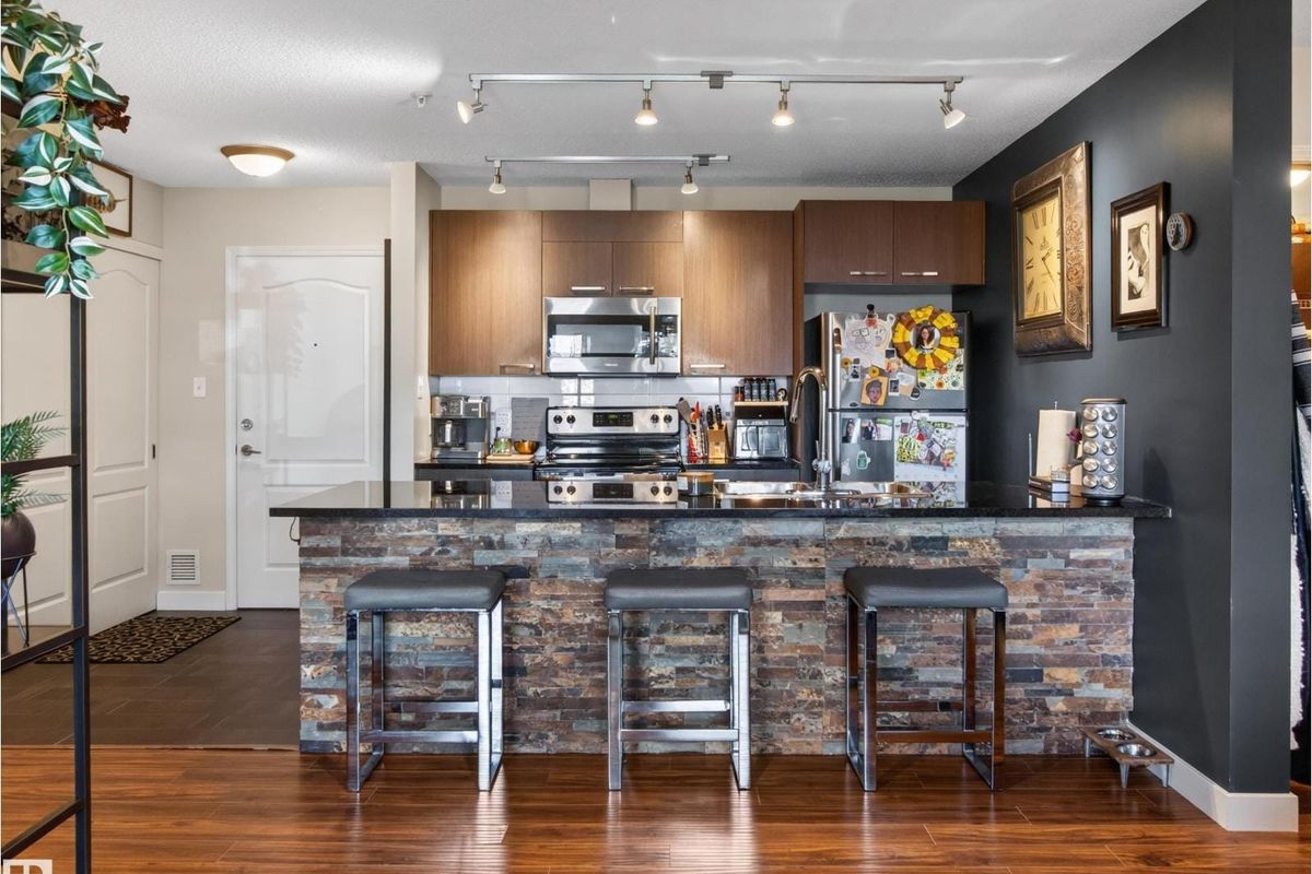 Kitchen with breakfast bar at #3107, 9351 Simpson Drive NW