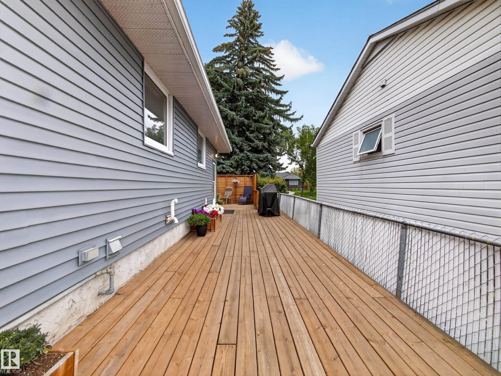 Deck running along the side of the house