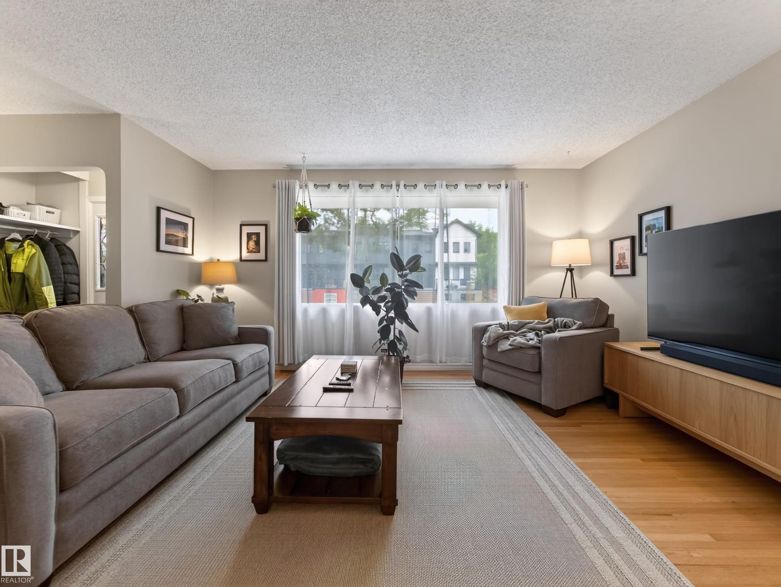 Living room with wide front window