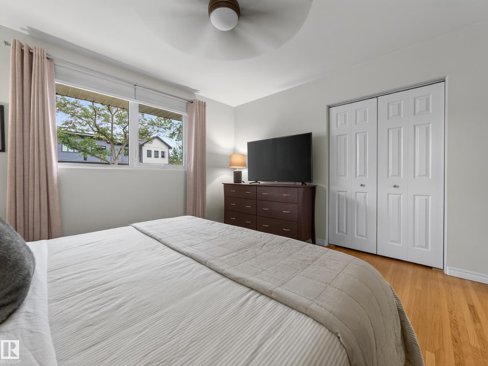 Bedroom with closet and window