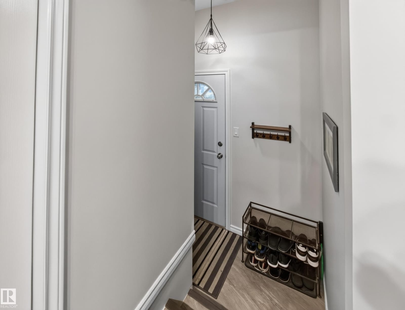 Entry with hardwood flooring