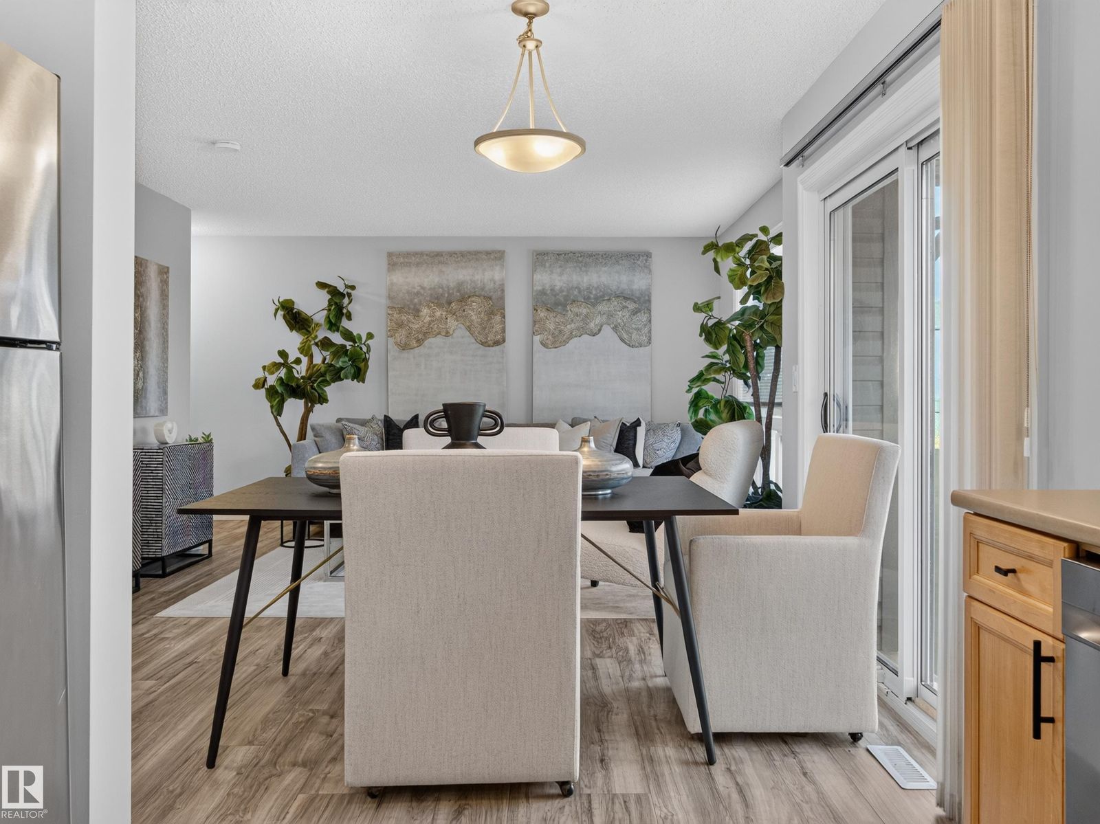 Dining table with the living room beyond