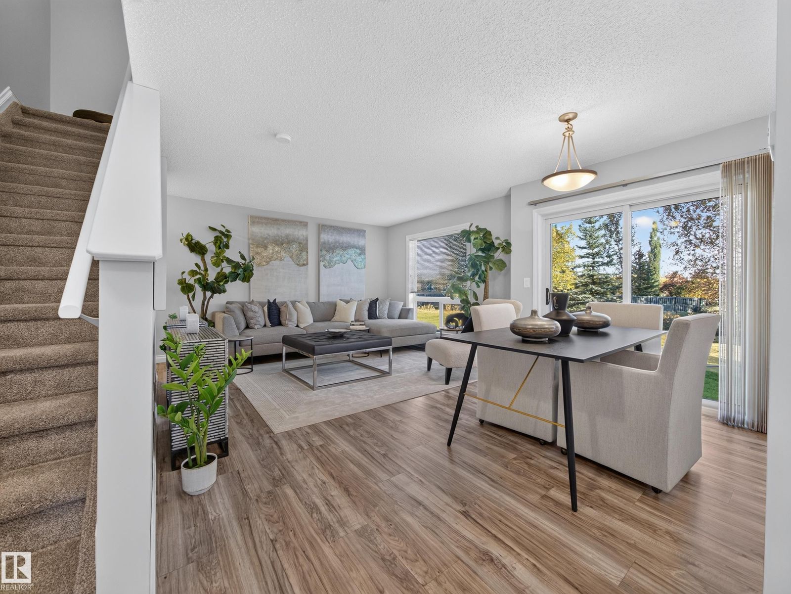 Living and dining area seen from the stairs