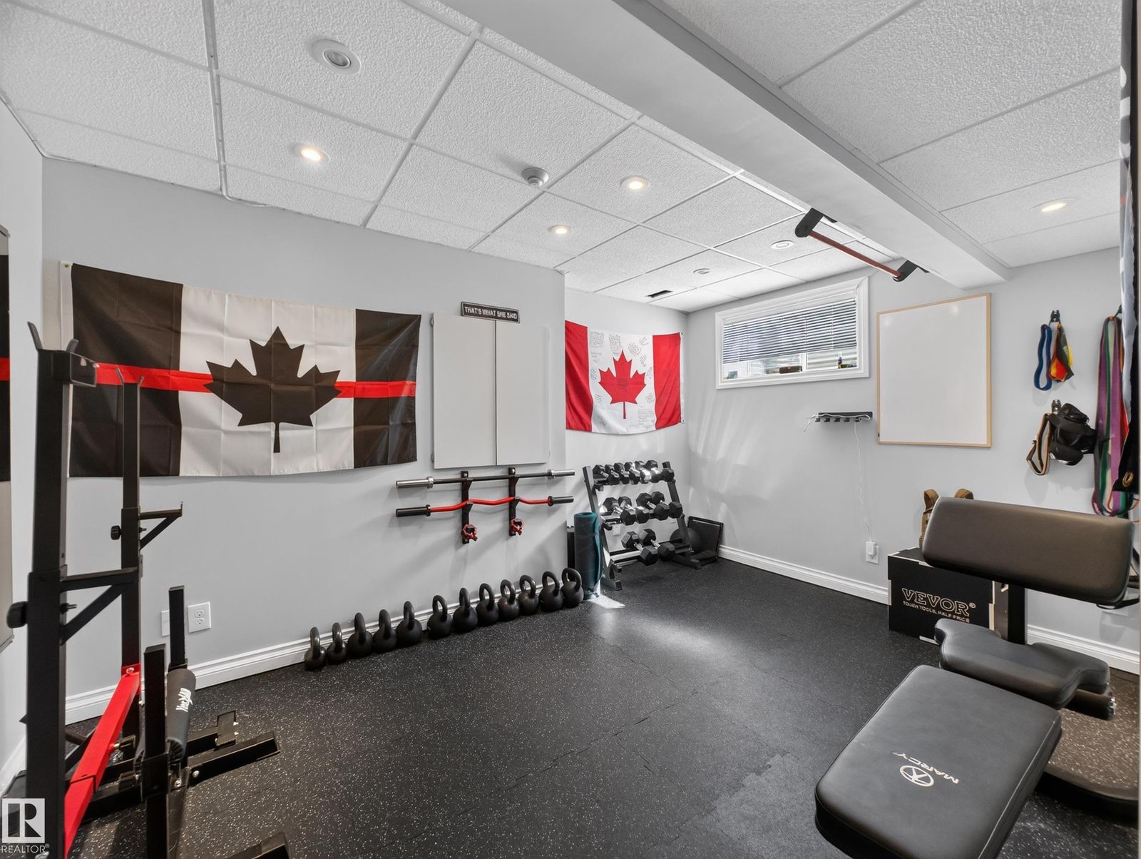 Finished basement set up as a home gym