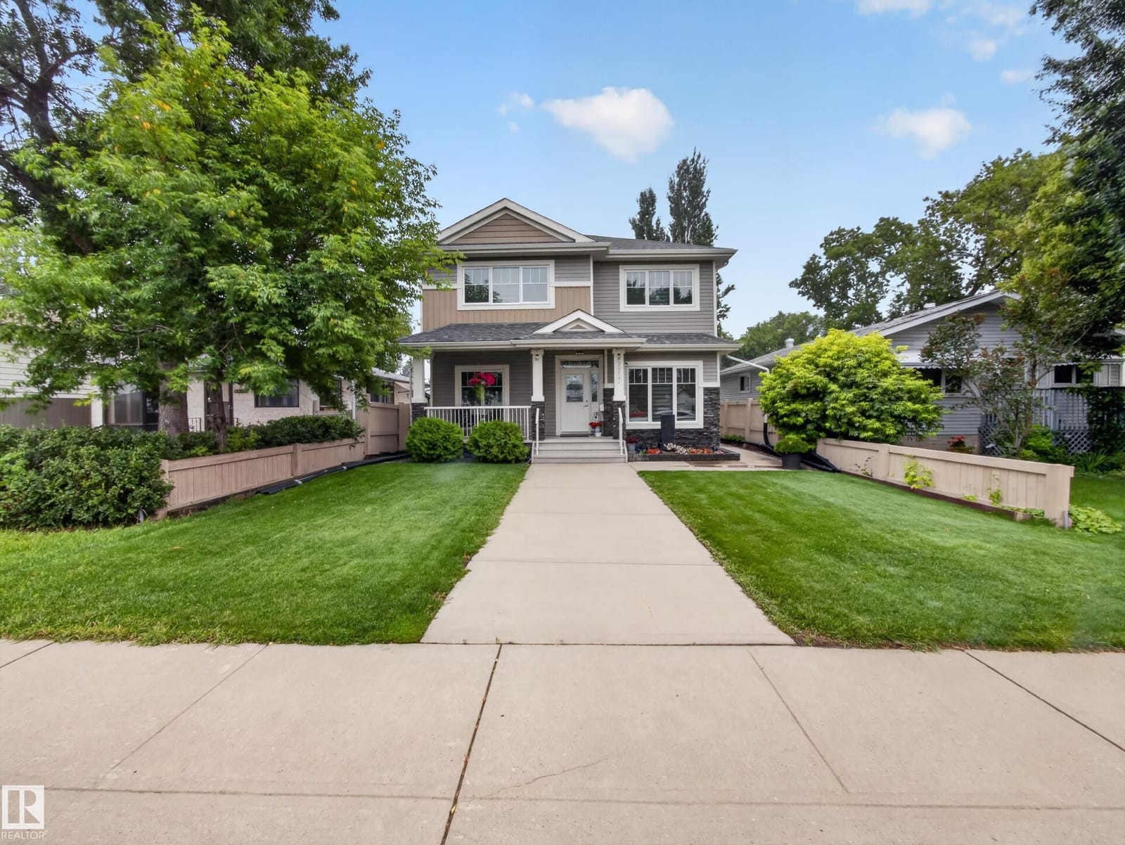 Front exterior with walkway and manicured lawn