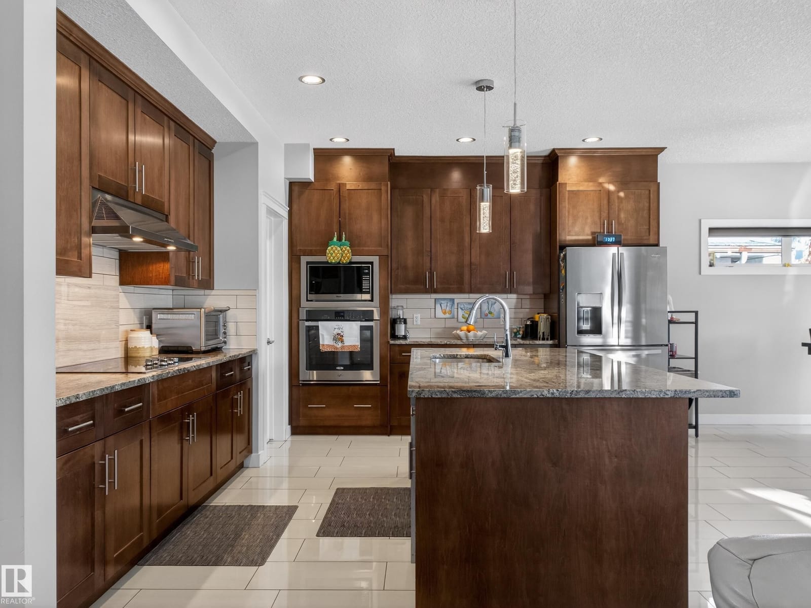 Kitchen run with built-in wall ovens