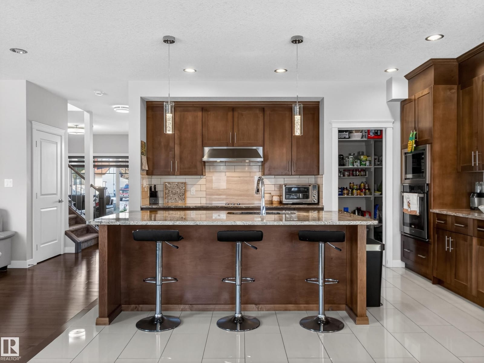 Kitchen island with breakfast bar seating