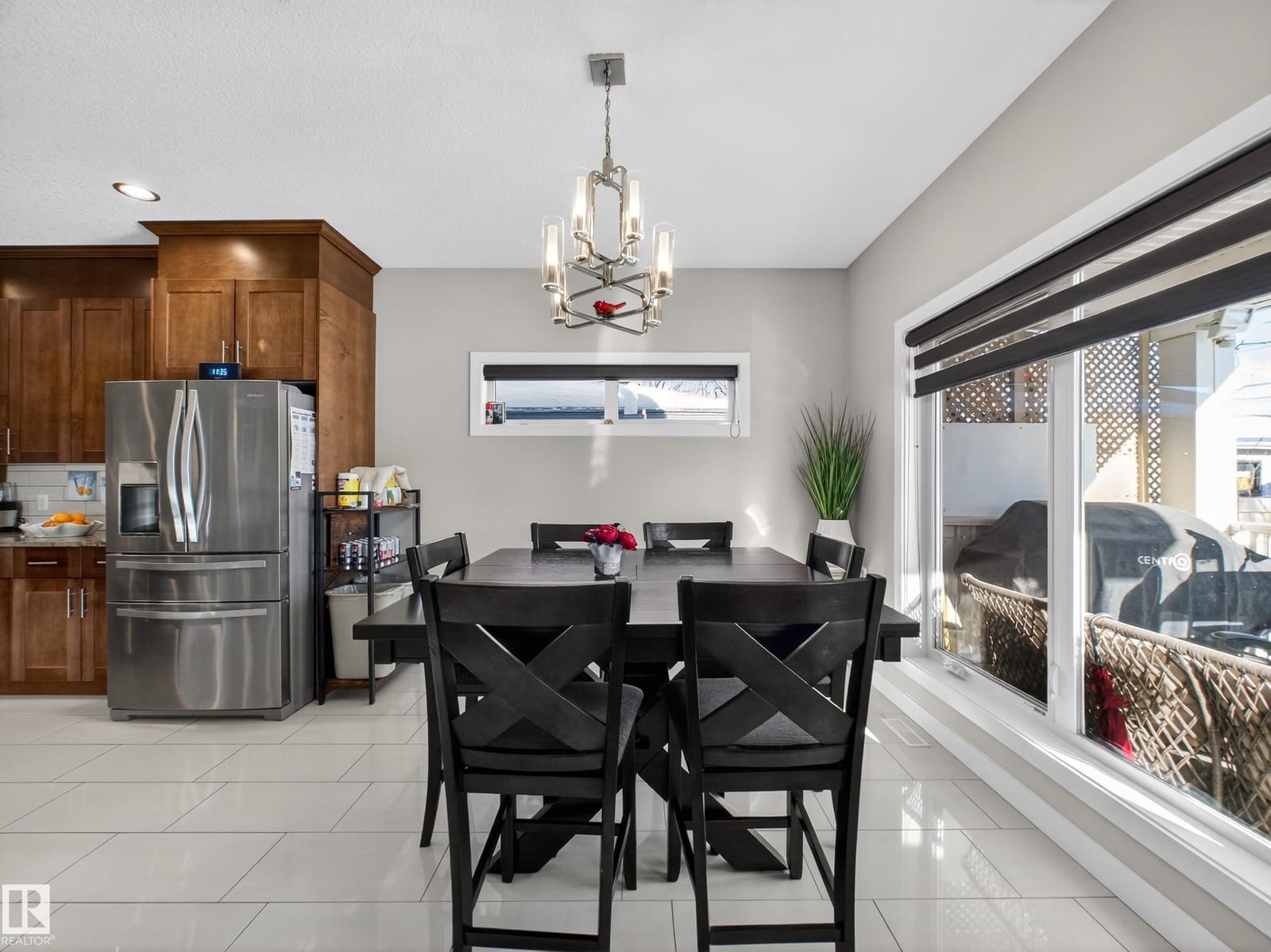 Dining area with chandelier seating six