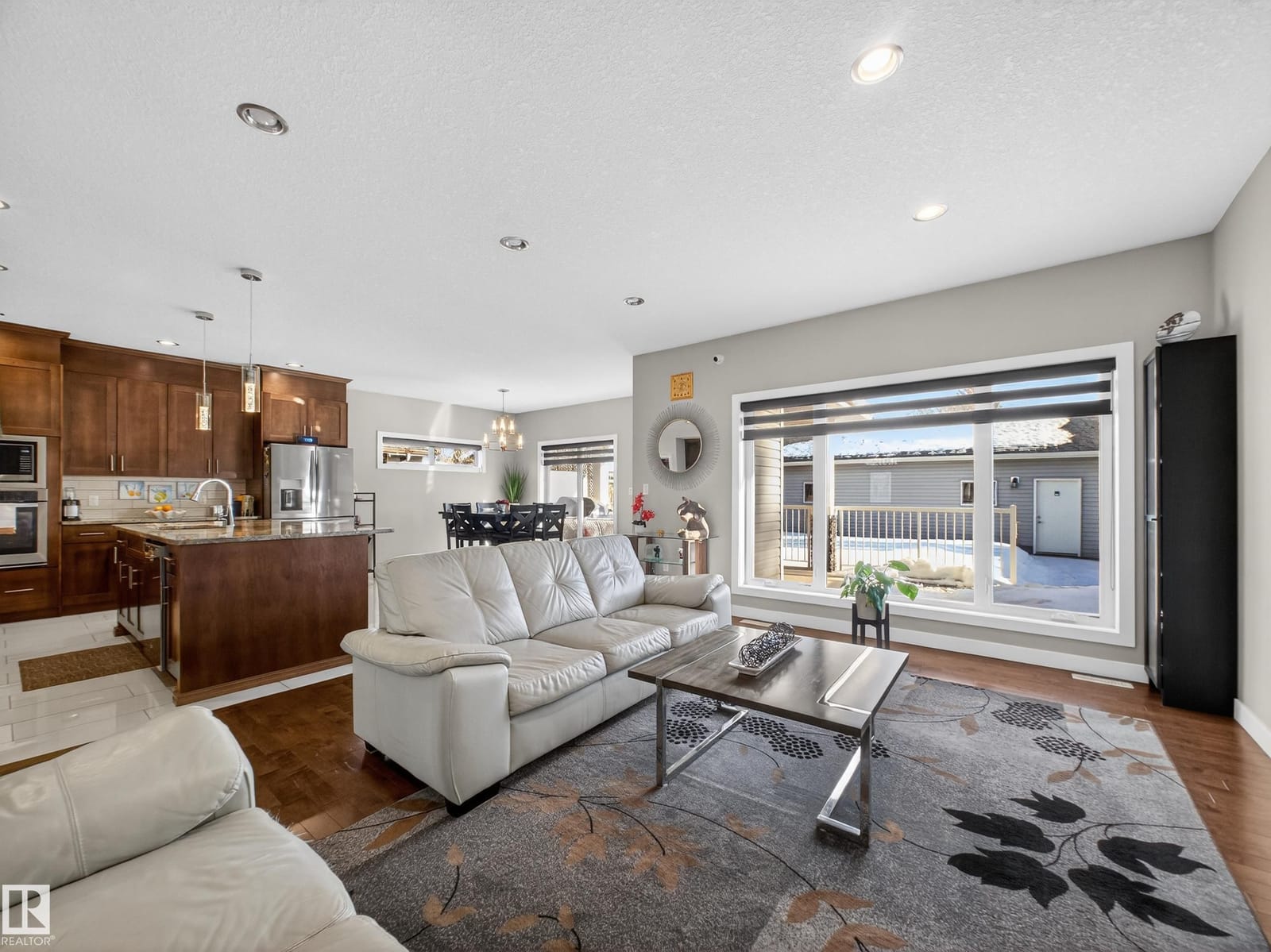 Great room seating open to the kitchen
