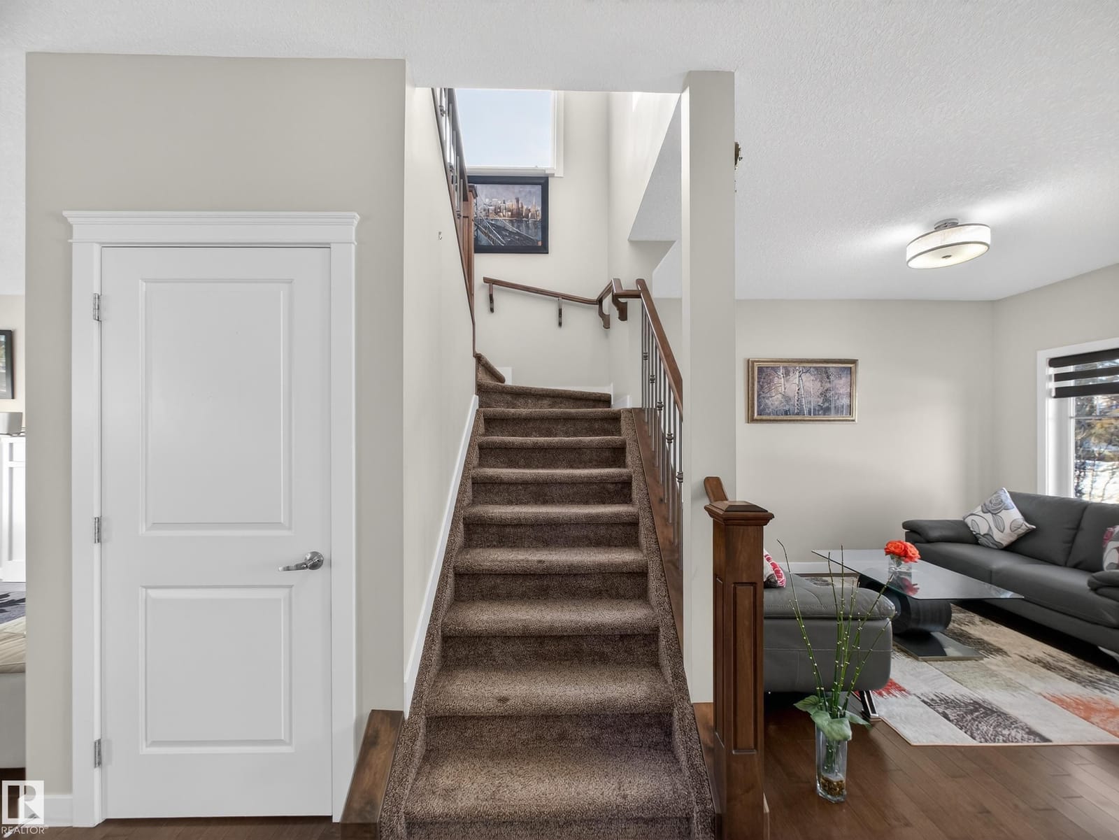 Staircase to the upper level from the front entry