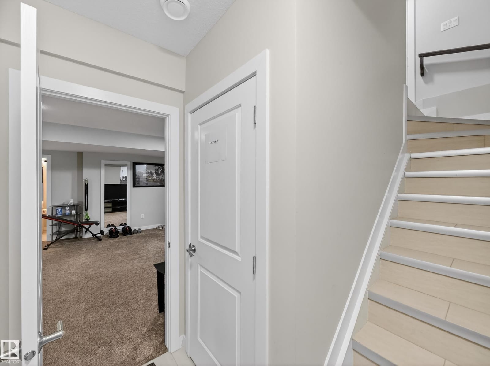Lower-level landing at the base of the stairs