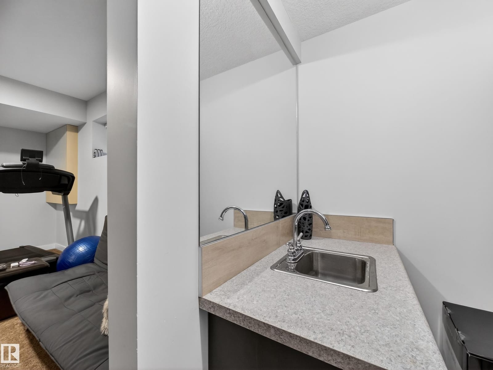 Wet bar sink in the recreation room